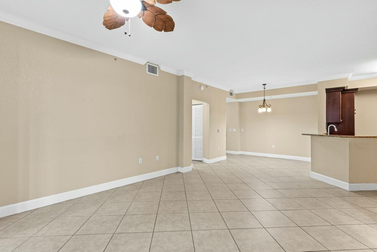 1690 Renaissance Commons Boulevard, Unit 1125 Boynton Beach, FL 33426 - Photo 9 of 37 a view of an empty room