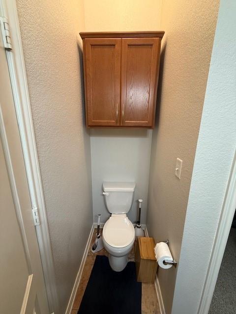 2513 South 2nd Street, Unit 3 Waco, TX 76706 - Photo 32 of 35 a bathroom with a toilet and a sink