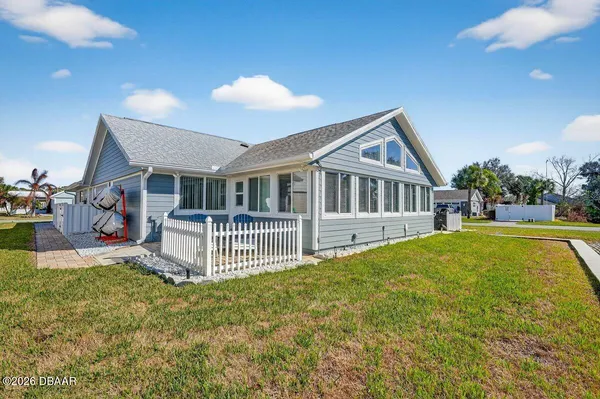 a front view of house with yard and porch