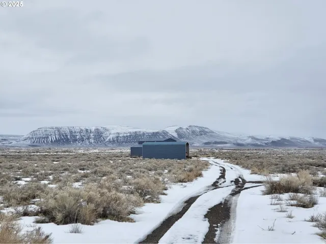 a view of an outdoor space with a lake view
