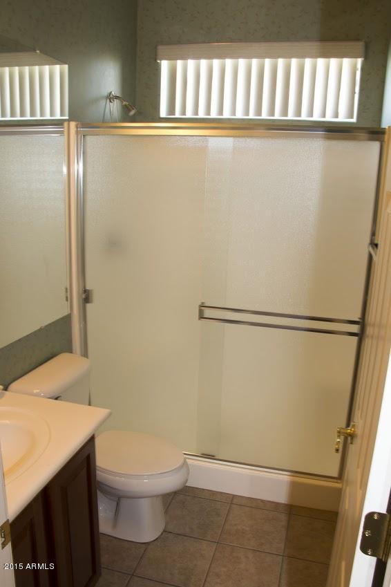 2123 North Pacey Road Phoenix, AZ 85037 - Photo 30 of 38 Guest Bathroom