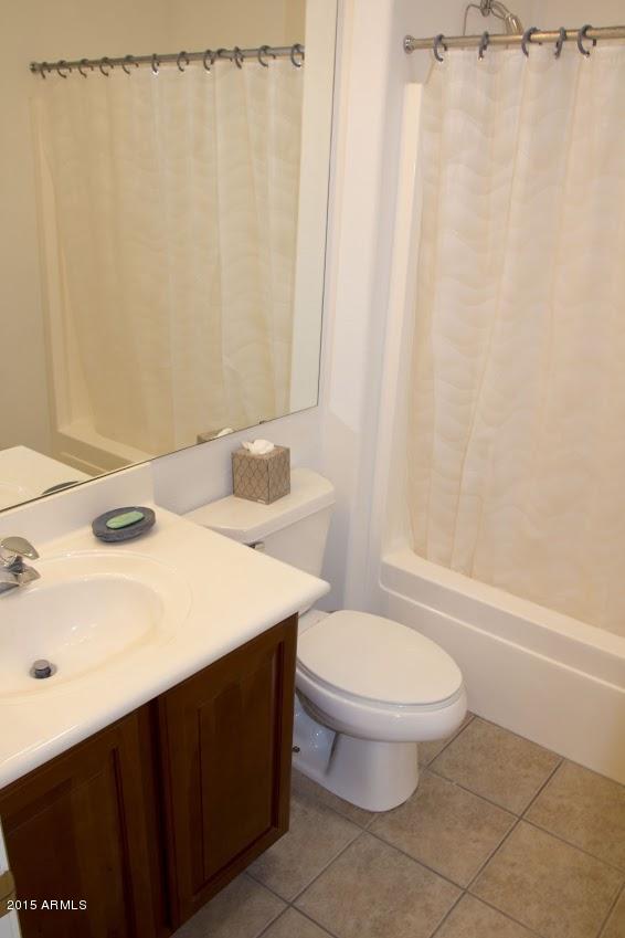 2123 North Pacey Road Phoenix, AZ 85037 - Photo 31 of 38 Hall bathroom 1