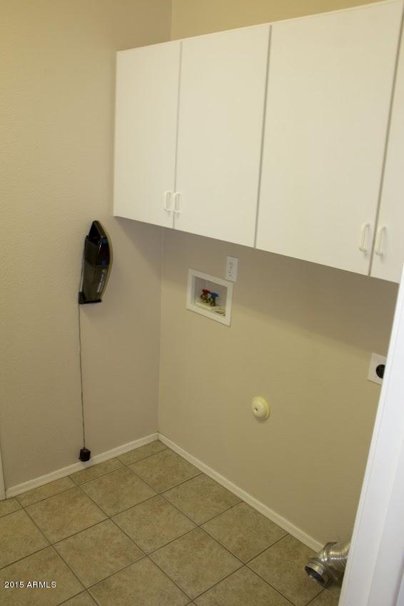 2123 North Pacey Road Phoenix, AZ 85037 - Photo 33 of 38 Laundry room 1