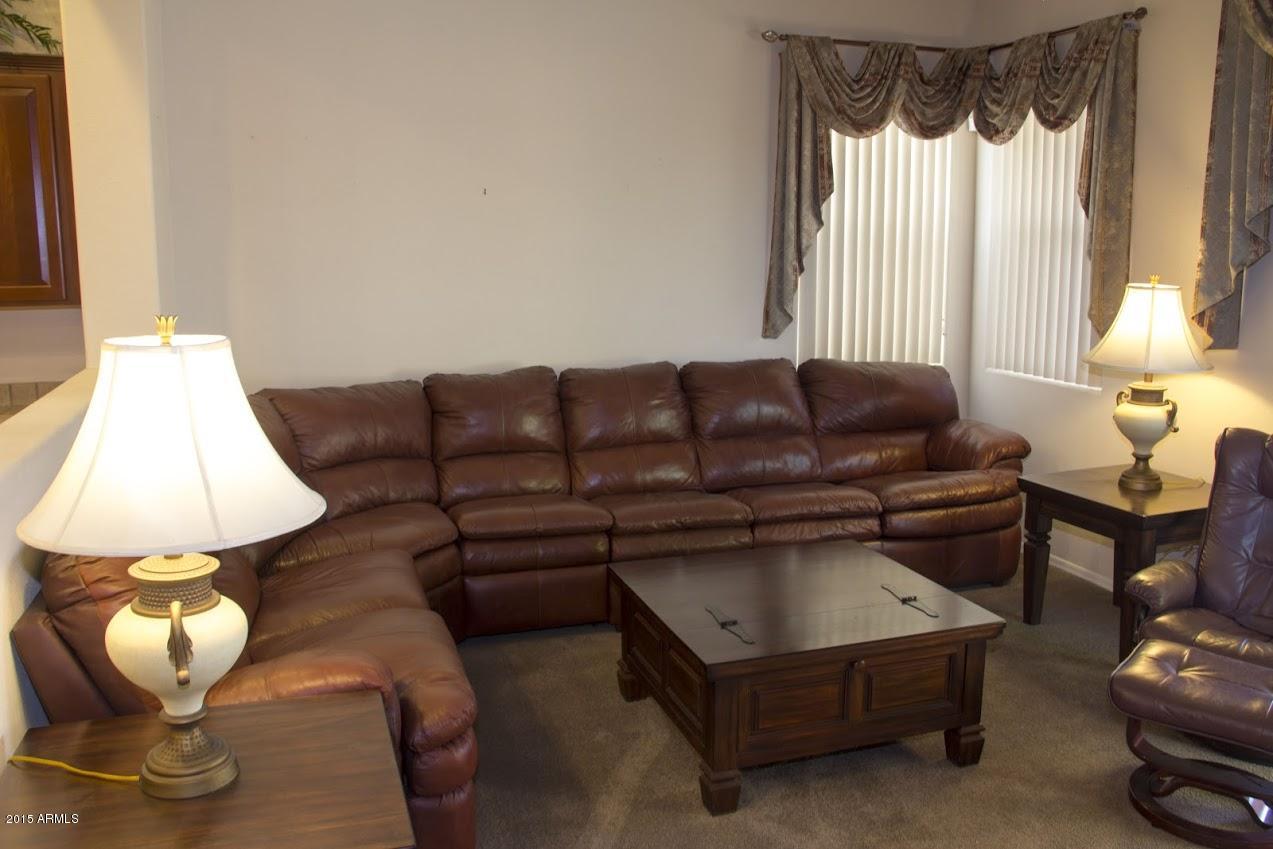 2123 North Pacey Road Phoenix, AZ 85037 - Photo 9 of 38 Family room 1