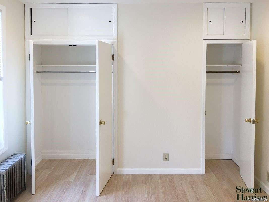 52-05 35th Street, Unit 2 Queens, NY 11101 - Photo 4 of 20 a view of walk in closet with wooden floor