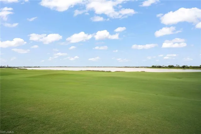 a view of a building with a yard