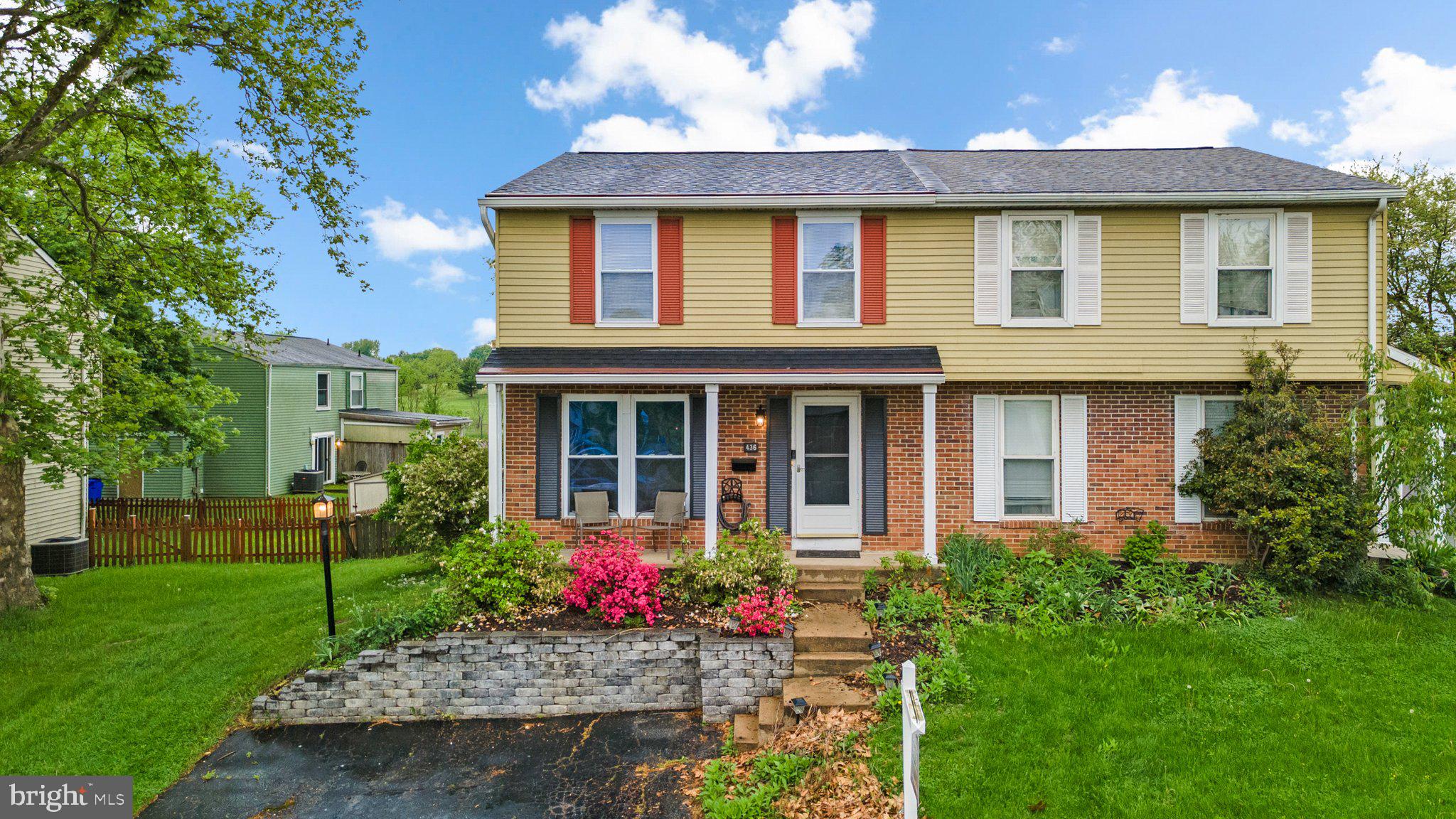 a front view of a house with a porch