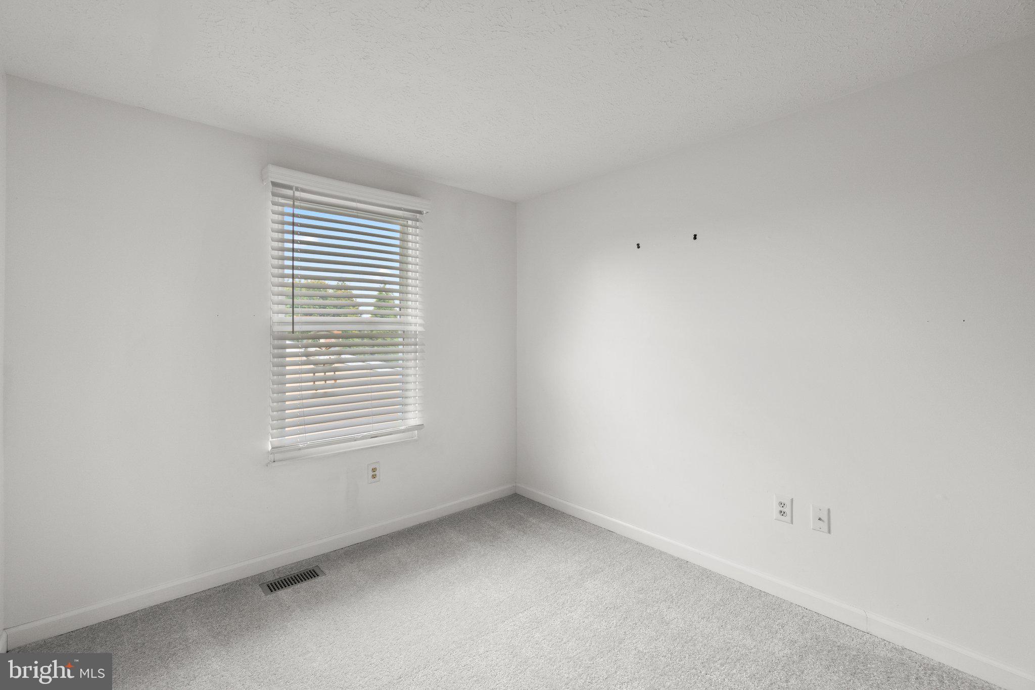 436 Heather Ridge Drive Frederick, MD 21702 - Photo 16 of 30 an empty room with a window