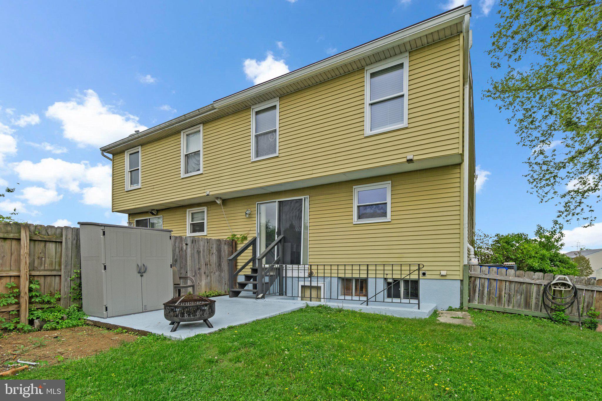 436 Heather Ridge Drive Frederick, MD 21702 - Photo 26 of 30 a front view of house with a garden and deck