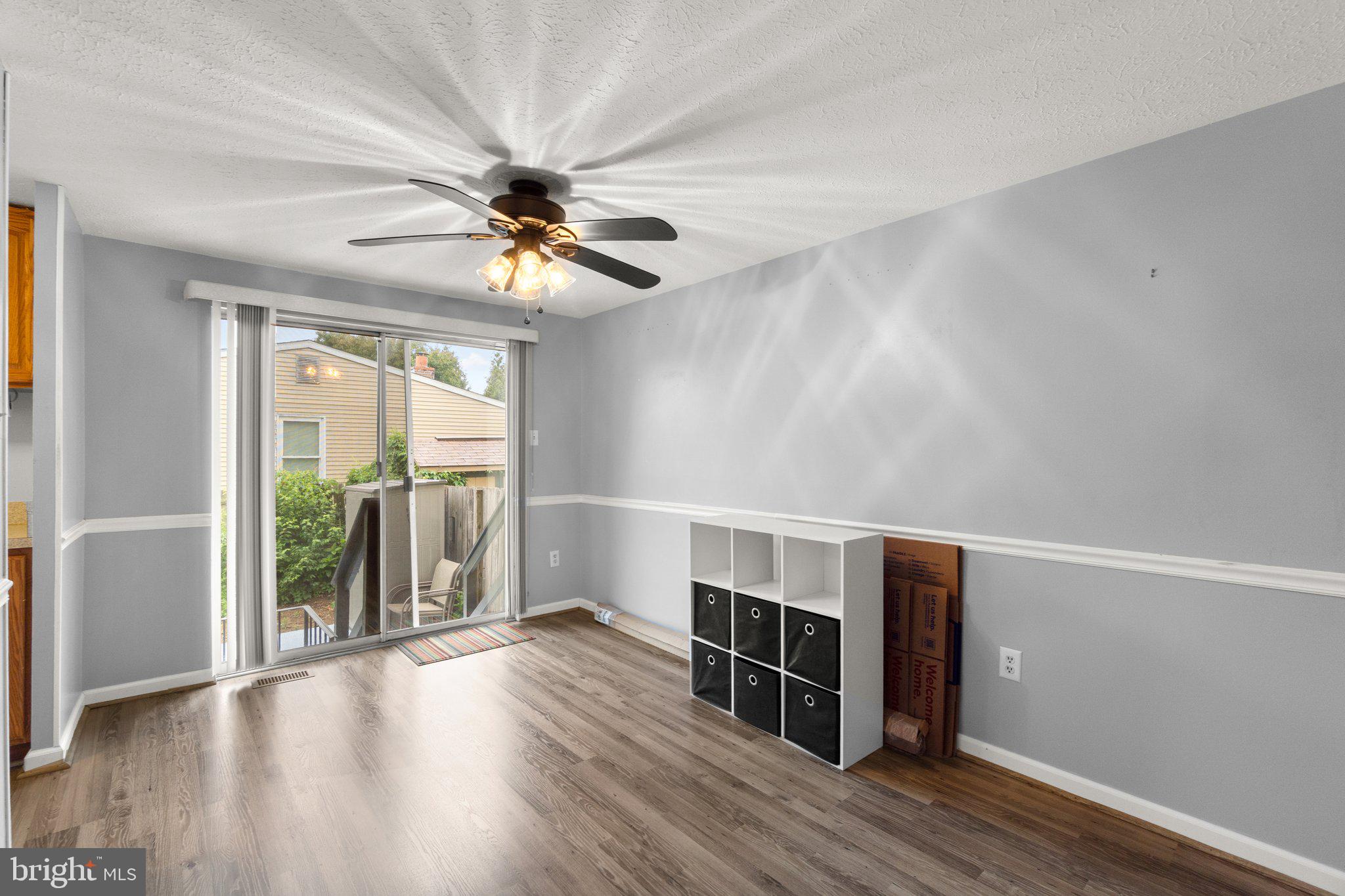 436 Heather Ridge Drive Frederick, MD 21702 - Photo 7 of 30 wooden floor in an empty room with a window