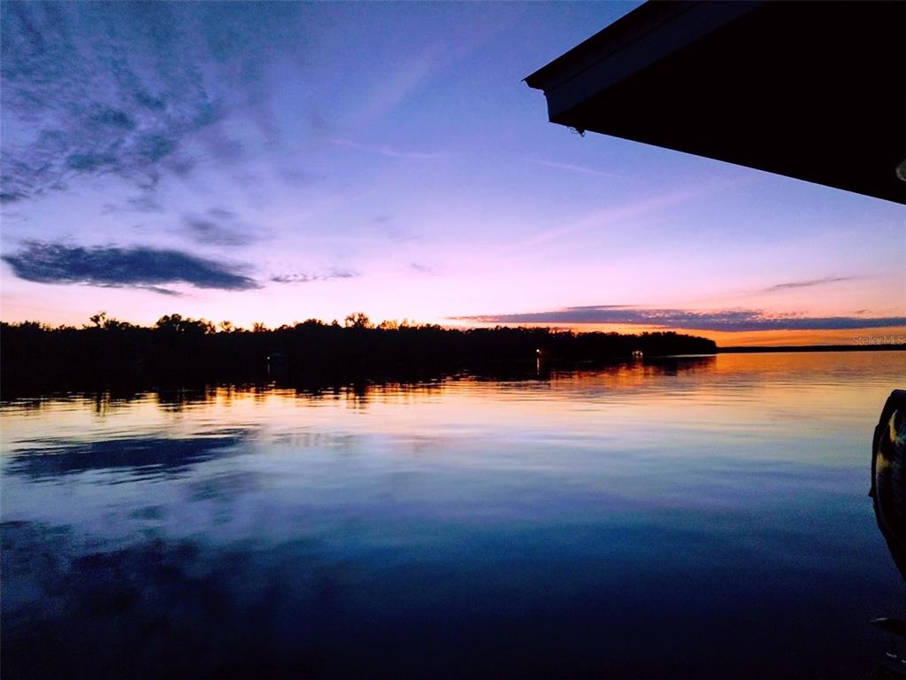 121 North Lake George Drive Georgetown, FL 32139 - Photo 2 of 46 a sunset view with a lake