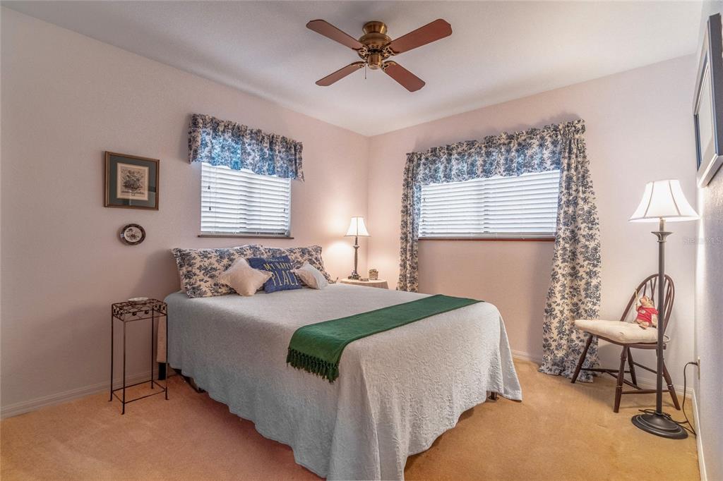 121 North Lake George Drive Georgetown, FL 32139 - Photo 21 of 46 a bedroom with a bed gym equipment and a window