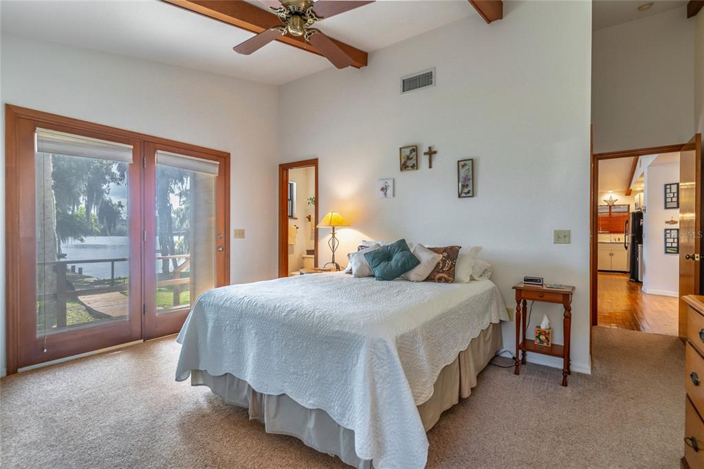 121 North Lake George Drive Georgetown, FL 32139 - Photo 25 of 46 a bedroom with a bed and a walk in closet