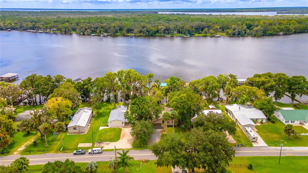 121 North Lake George Drive Georgetown, FL 32139 - Photo 36 of 46 a view of a lake with a yard