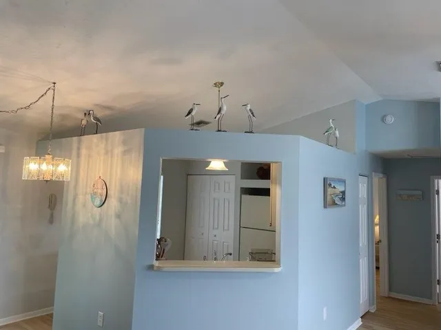 a bathroom with a mirror sink and shower