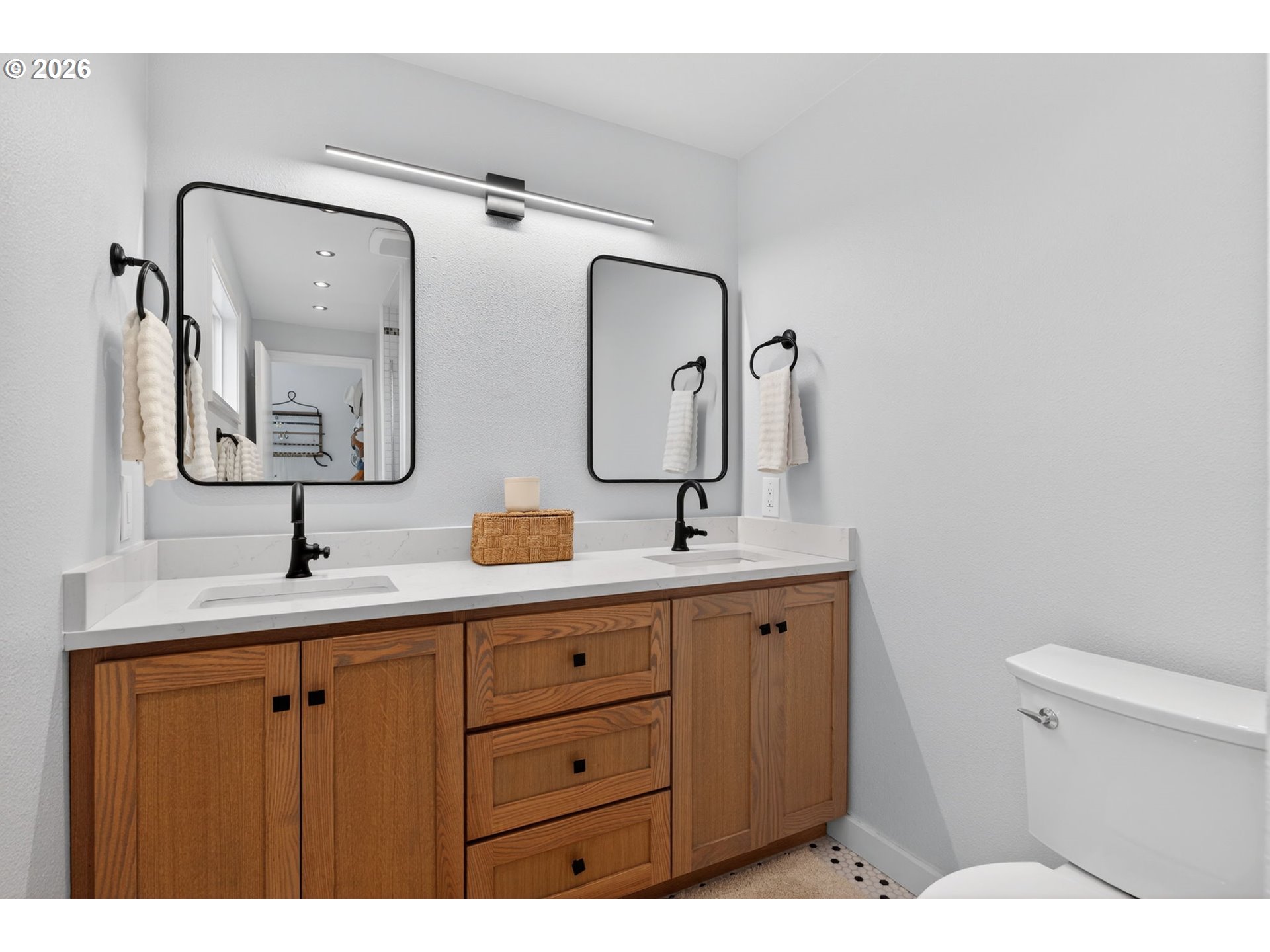 8115 Southwest Hemlock Street Portland, OR 97223 - Photo 19 of 36 a bathroom with a sink and a mirror