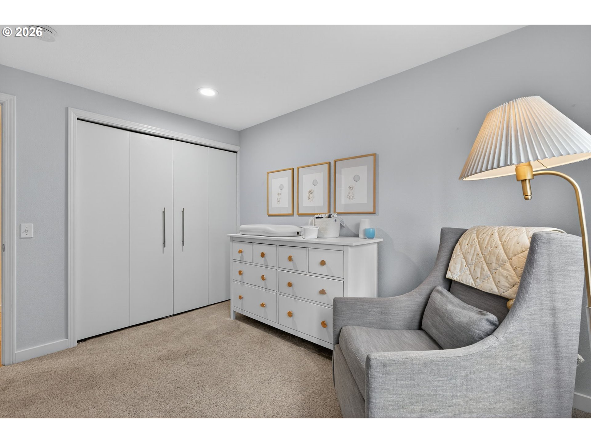 8115 Southwest Hemlock Street Portland, OR 97223 - Photo 21 of 36 a bedroom with furniture and a dresser