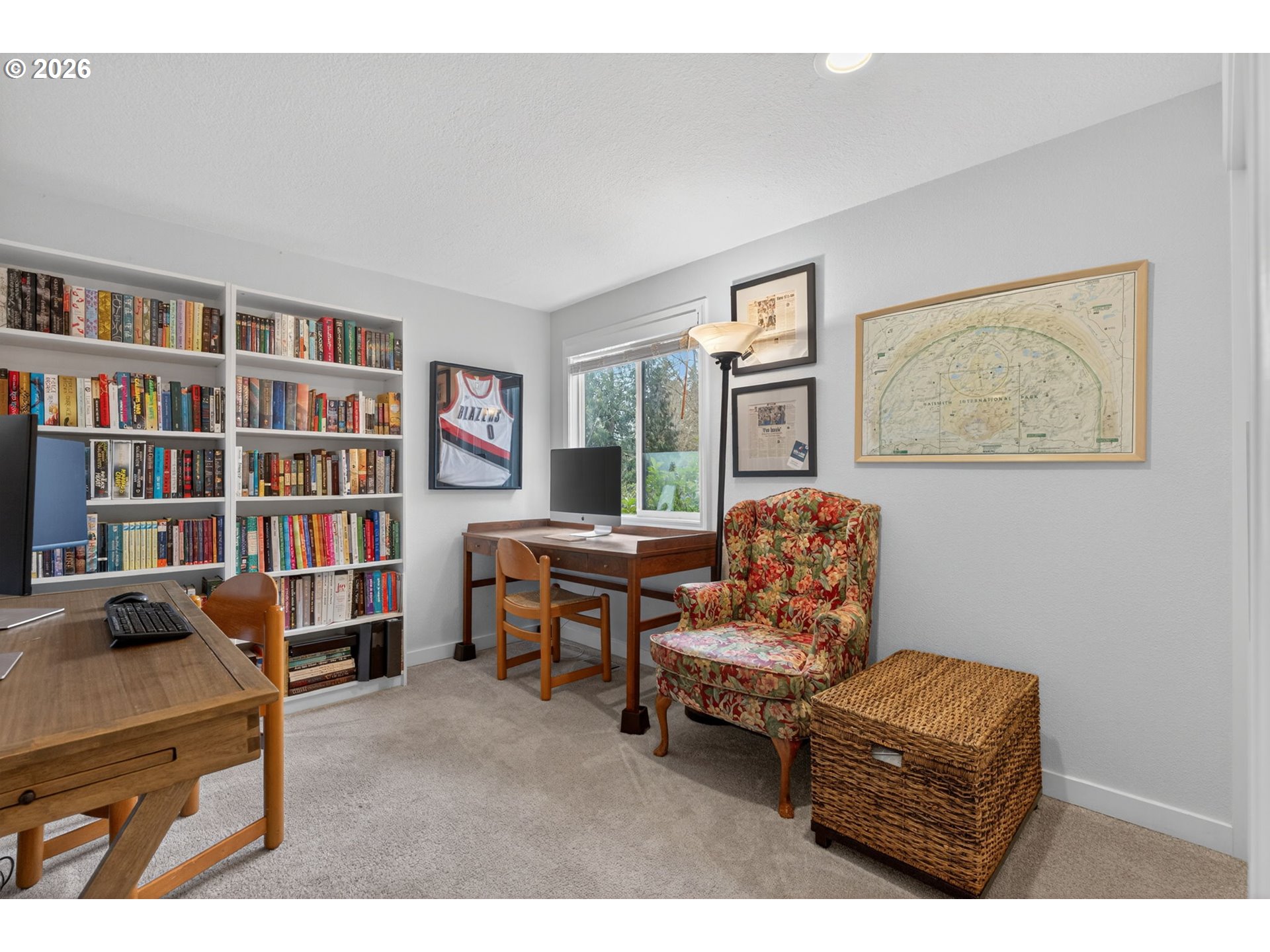 8115 Southwest Hemlock Street Portland, OR 97223 - Photo 22 of 36 a living room with furniture and a bookshelf