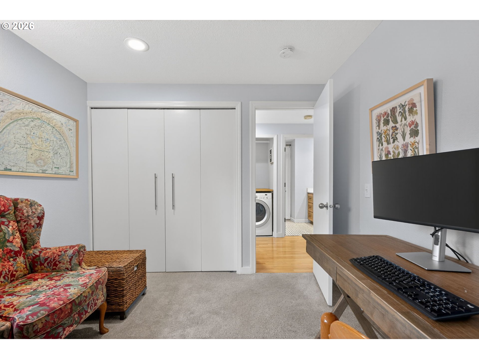 8115 Southwest Hemlock Street Portland, OR 97223 - Photo 23 of 36 a living room with furniture and a flat screen tv