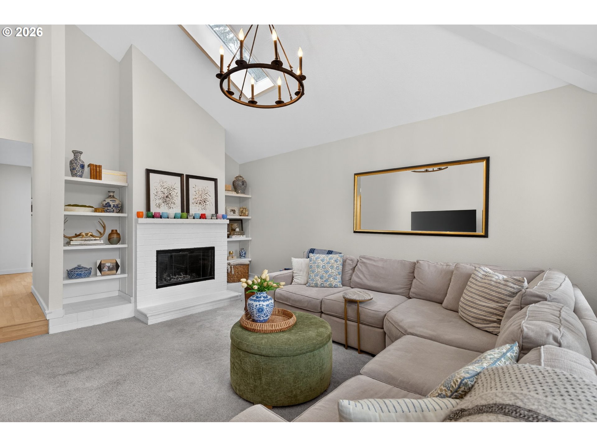 8115 Southwest Hemlock Street Portland, OR 97223 - Photo 4 of 36 a living room with furniture and a fireplace