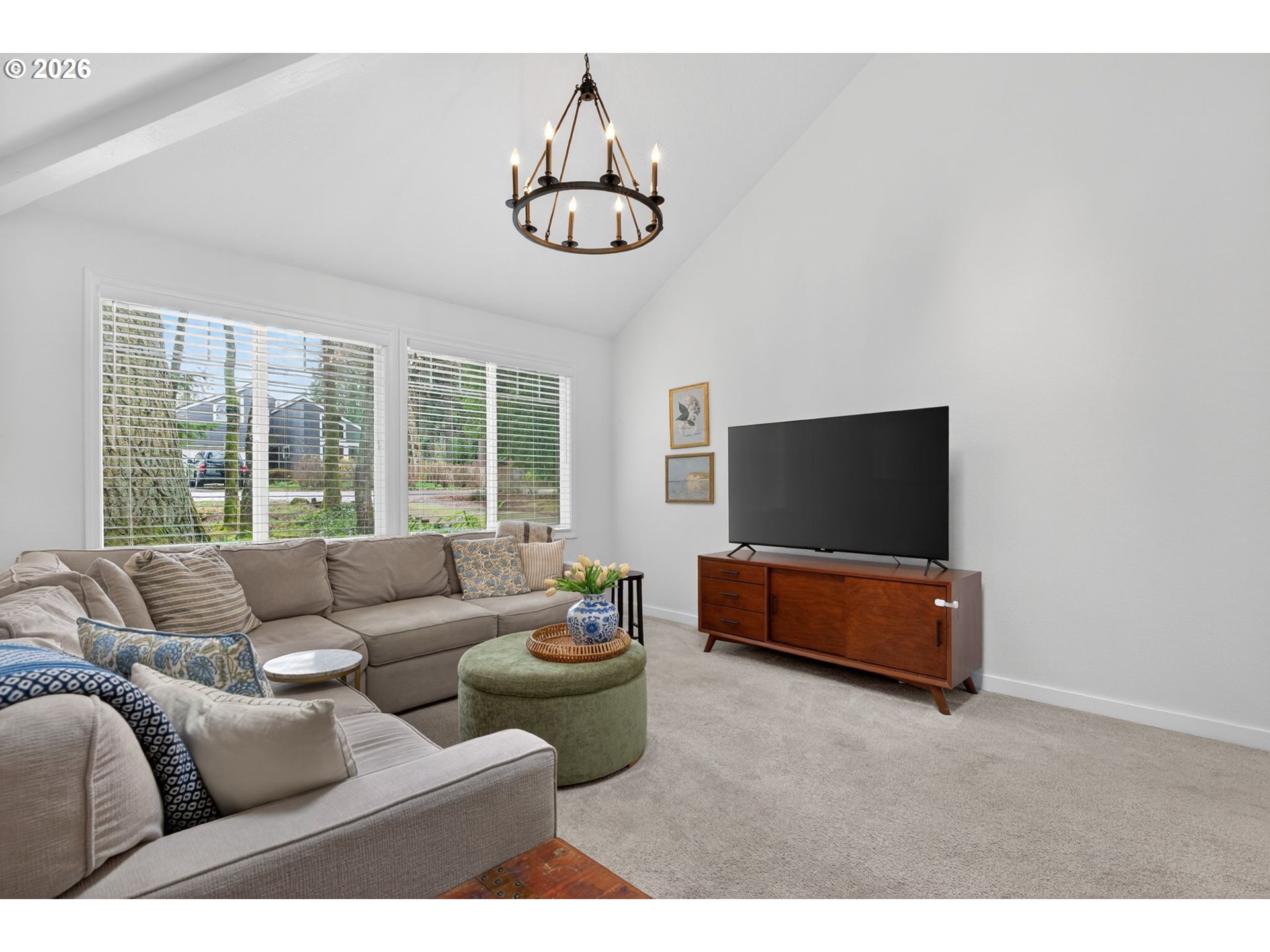 8115 Southwest Hemlock Street Portland, OR 97223 - Photo 6 of 36 a living room with furniture and a flat screen tv