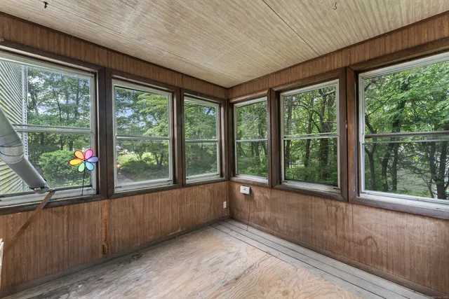 a view of a room with a large window