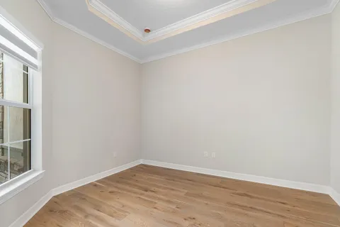 a utility room with cabinets washer and dryer