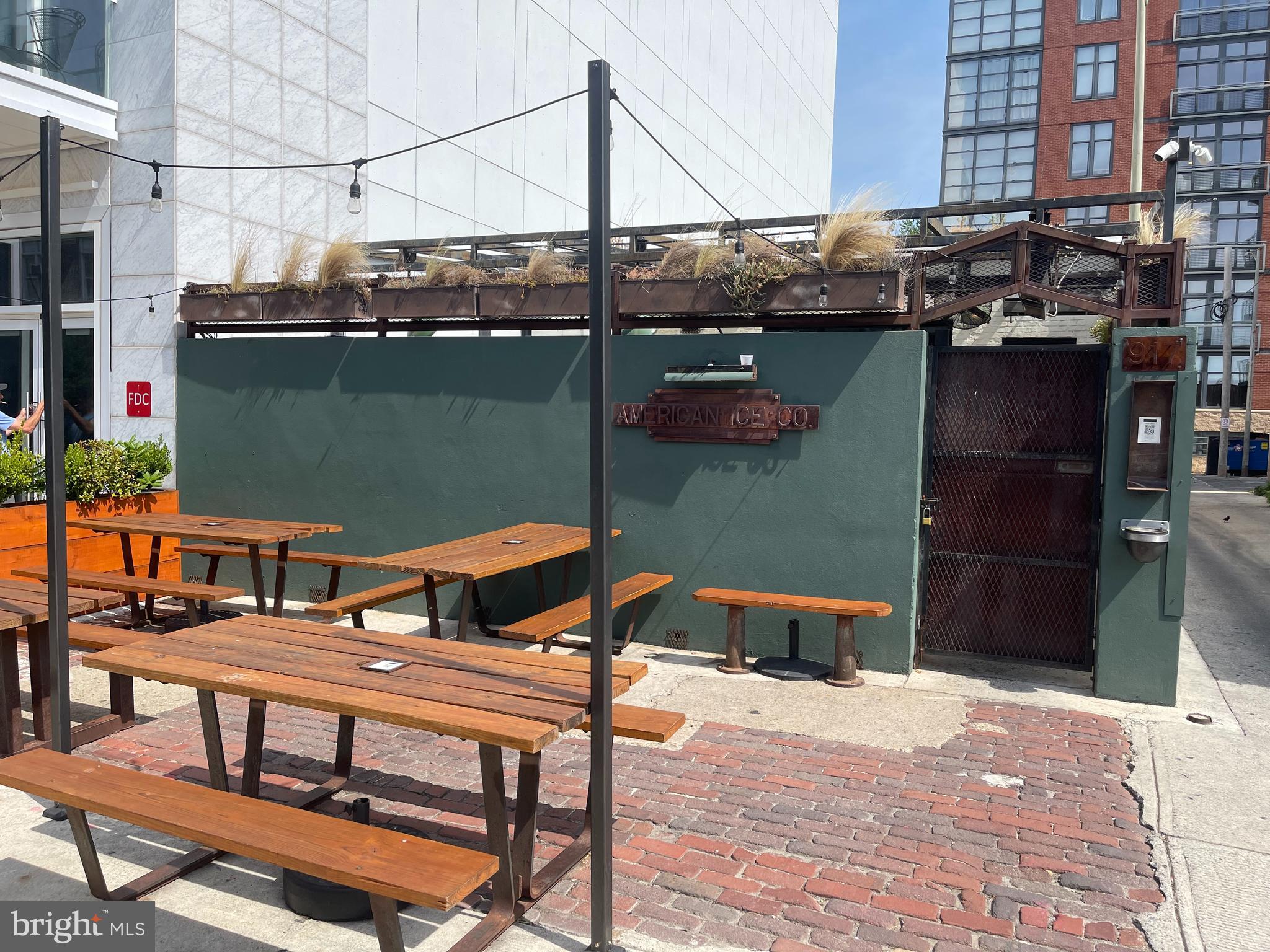 2120 Vermont Avenue Northwest, Unit 620 Washington, DC 20001 - Photo 40 of 69 a terrace with outdoor seating and city view