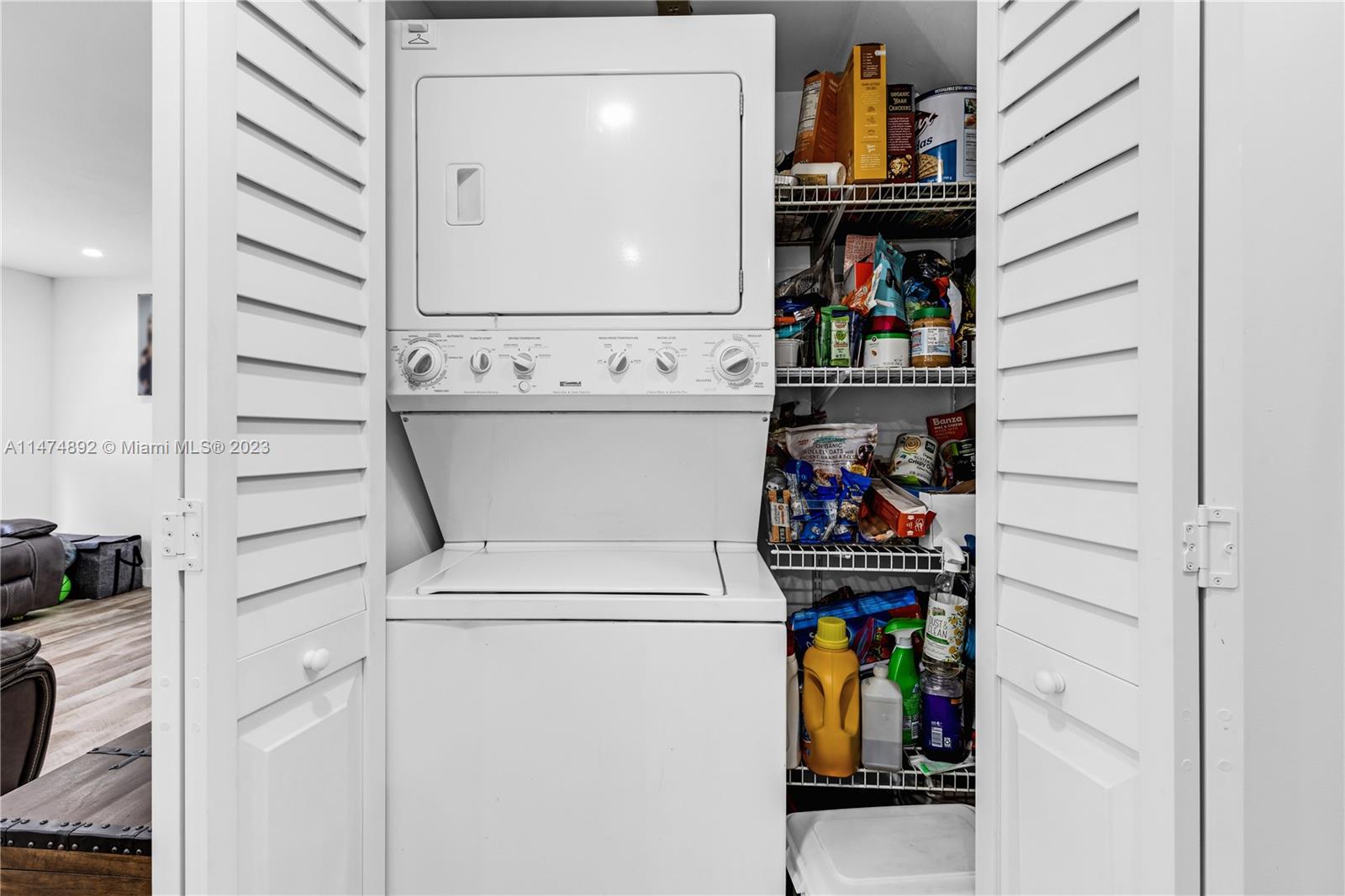 6825 Southwest 45th Lane, Unit 1 Miami, FL 33155 - Photo 15 of 28 a utility room with dryer and washer