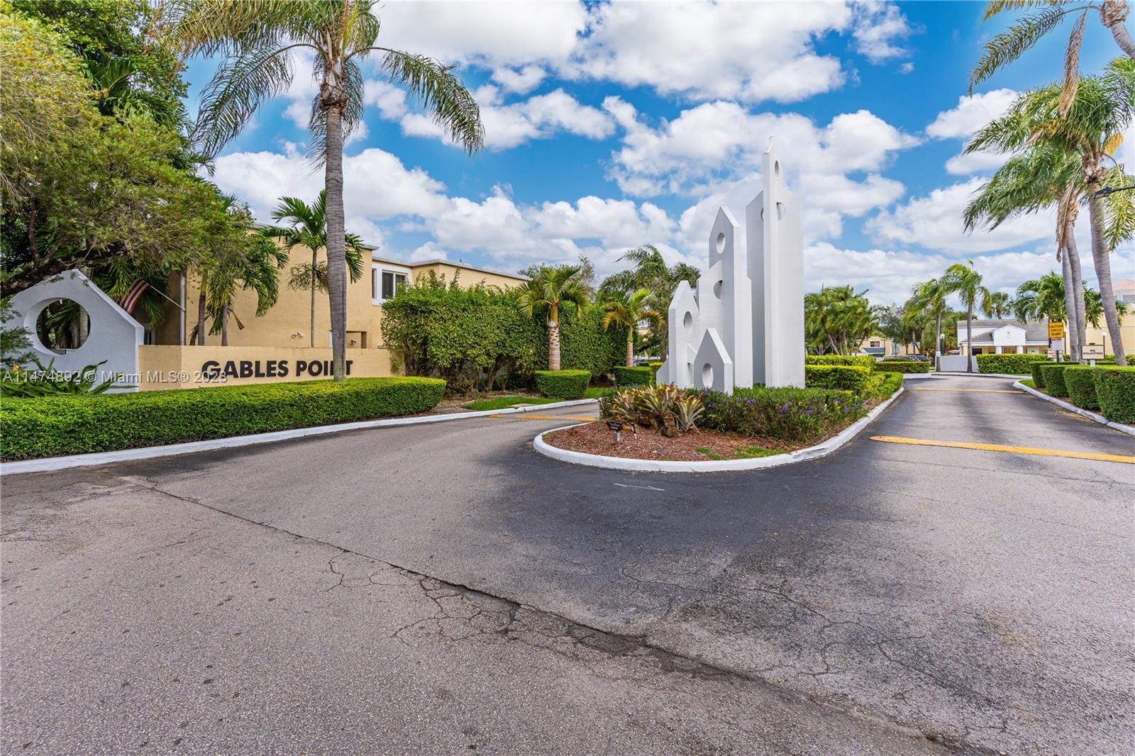 6825 Southwest 45th Lane, Unit 1 Miami, FL 33155 - Photo 22 of 28 a view of a fountain in front of a house with a big yard
