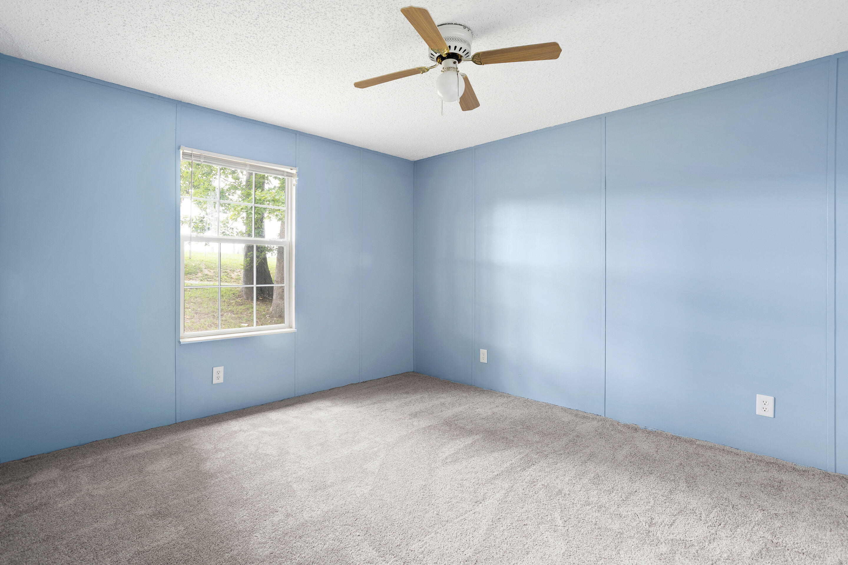910 Dobbins Hollow Road Riner, VA 24149 - Photo 11 of 35 a view of an empty room with a window