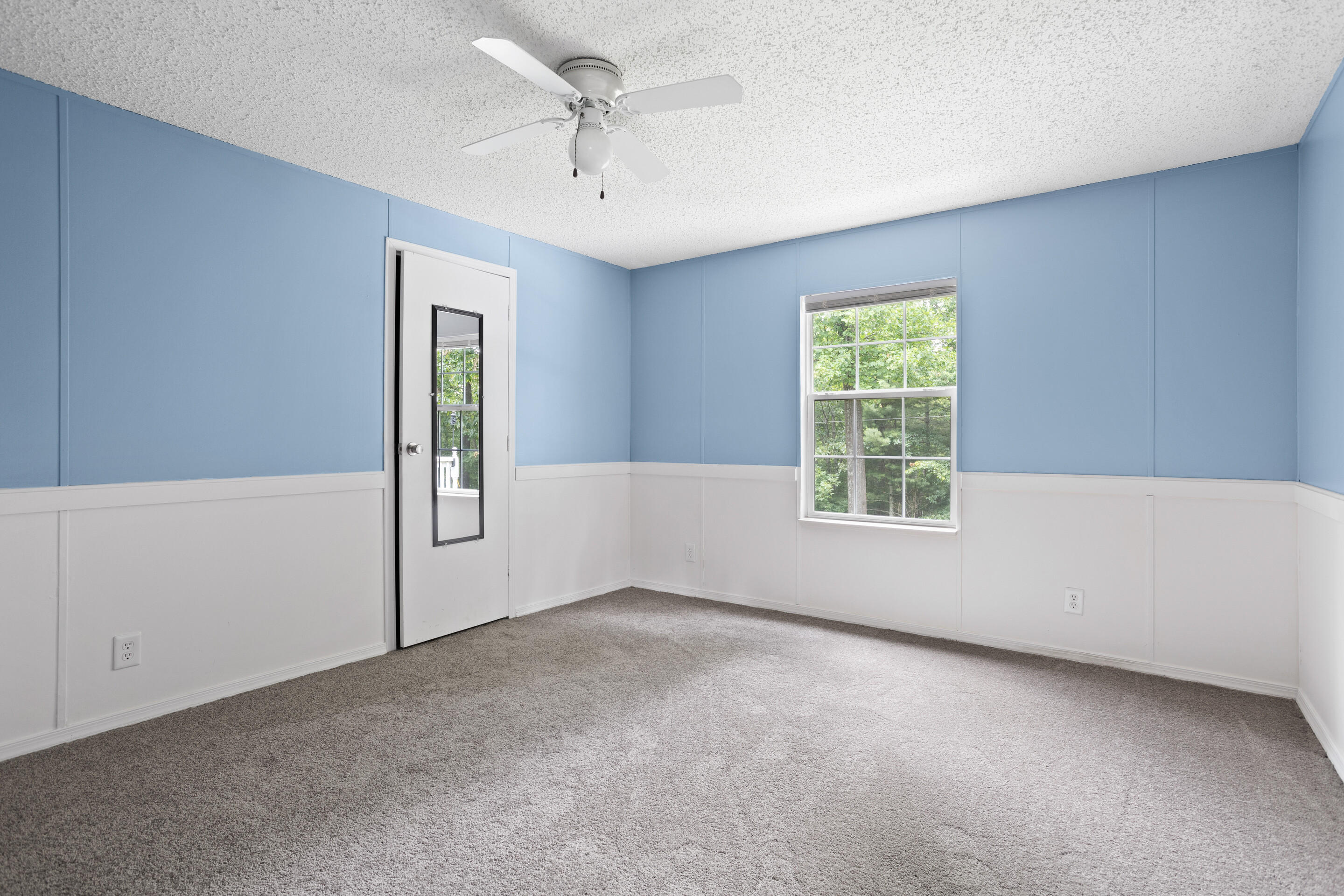 910 Dobbins Hollow Road Riner, VA 24149 - Photo 13 of 35 a view of an empty room with a window