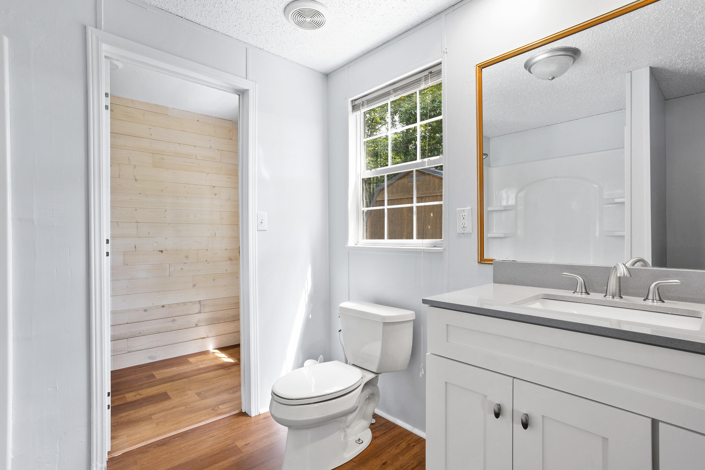 910 Dobbins Hollow Road Riner, VA 24149 - Photo 25 of 35 a bathroom with a sink a toilet and shower