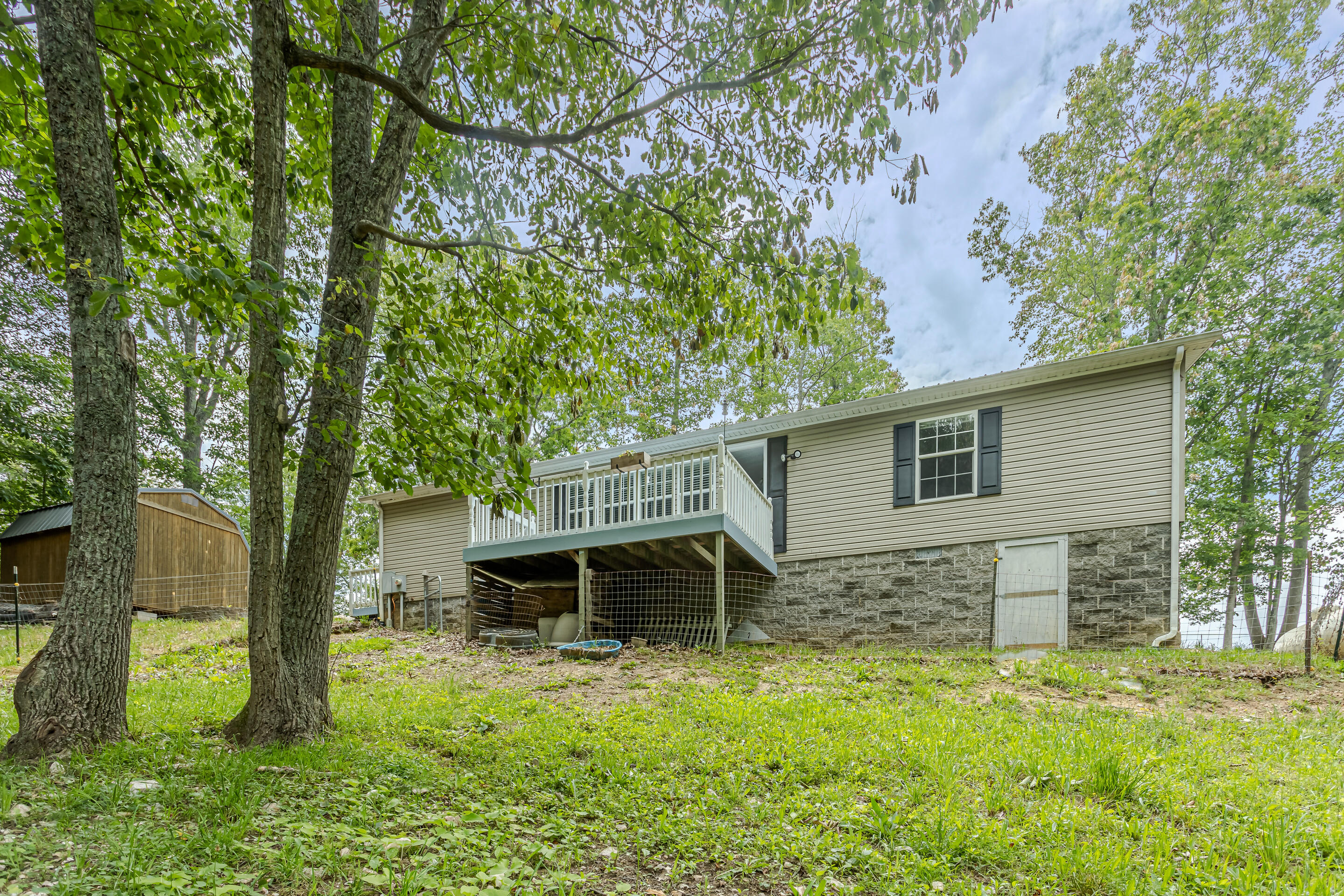 910 Dobbins Hollow Road Riner, VA 24149 - Photo 33 of 35 front view of a house with a yard