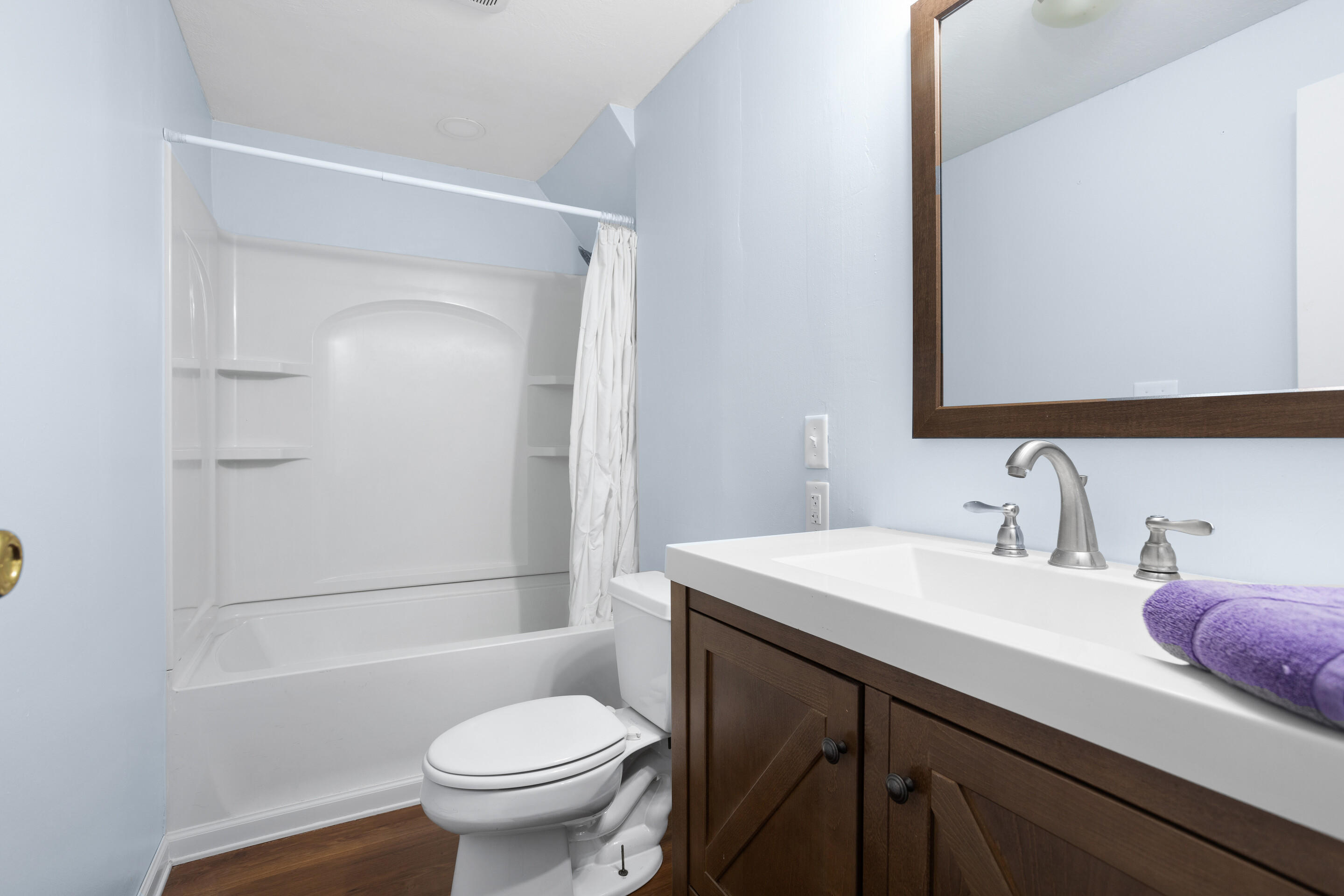 910 Dobbins Hollow Road Riner, VA 24149 - Photo 9 of 35 a bathroom with a sink a toilet and shower