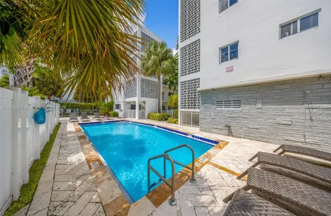 a view of a balcony with plants