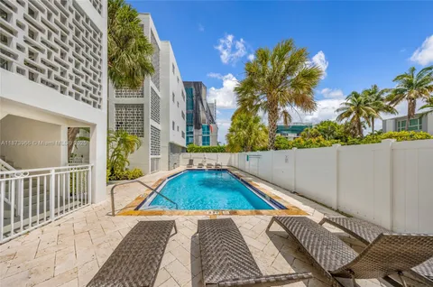 a view of balcony with a potted plant
