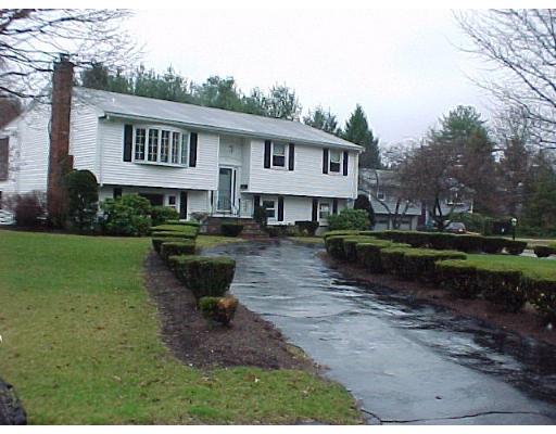 10 Jeffrey Road Canton, MA 02021 - Photo 1 of 16 a view of a house with backyard and sitting area