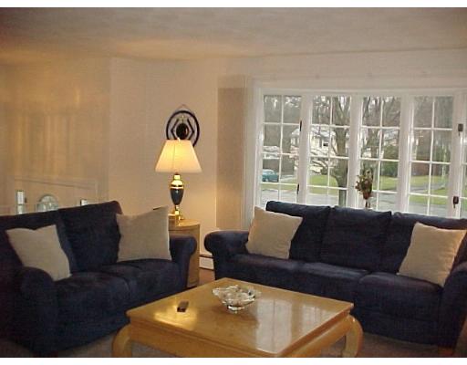10 Jeffrey Road Canton, MA 02021 - Photo 2 of 16 a living room with furniture and a window