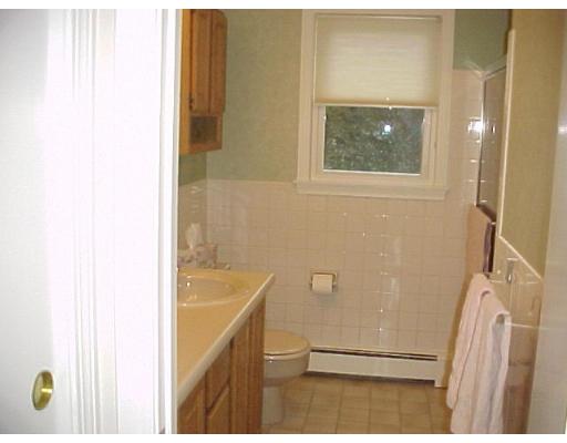 10 Jeffrey Road Canton, MA 02021 - Photo 9 of 16 a bathroom with a sink a toilet and bathtub