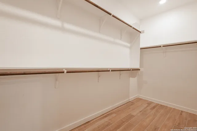 a view of an empty walk in closet
