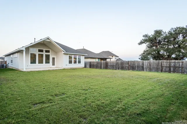 a house view with a garden space