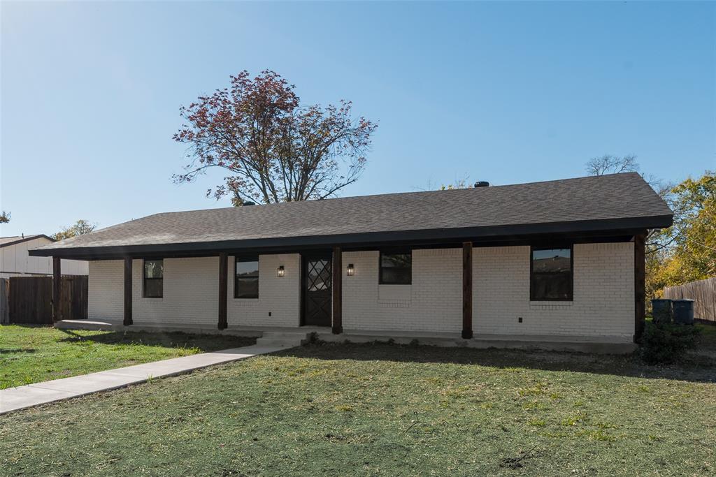 3913 Southridge Drive Rowlett, TX 75088 - Photo 1 of 1 a house that has a tree in front of it