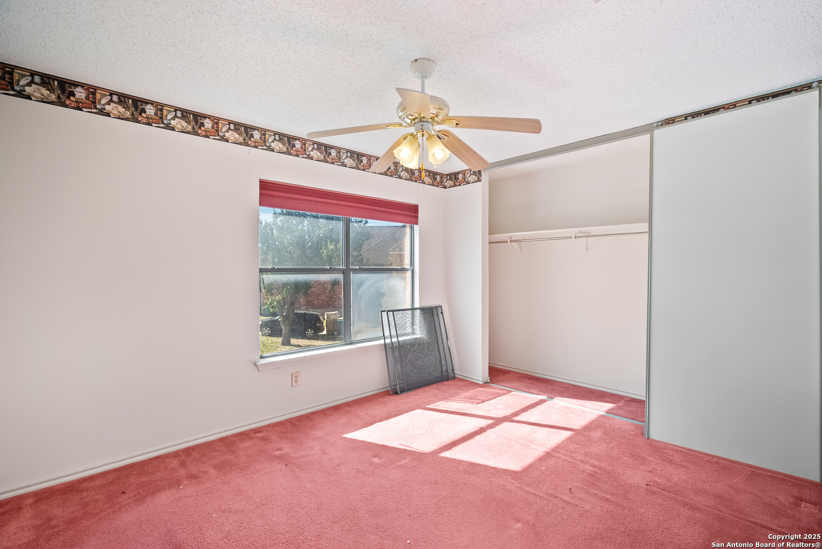 7723 Red River Bay Converse, TX 78109 - Photo 11 of 16 a view of an empty room with a window