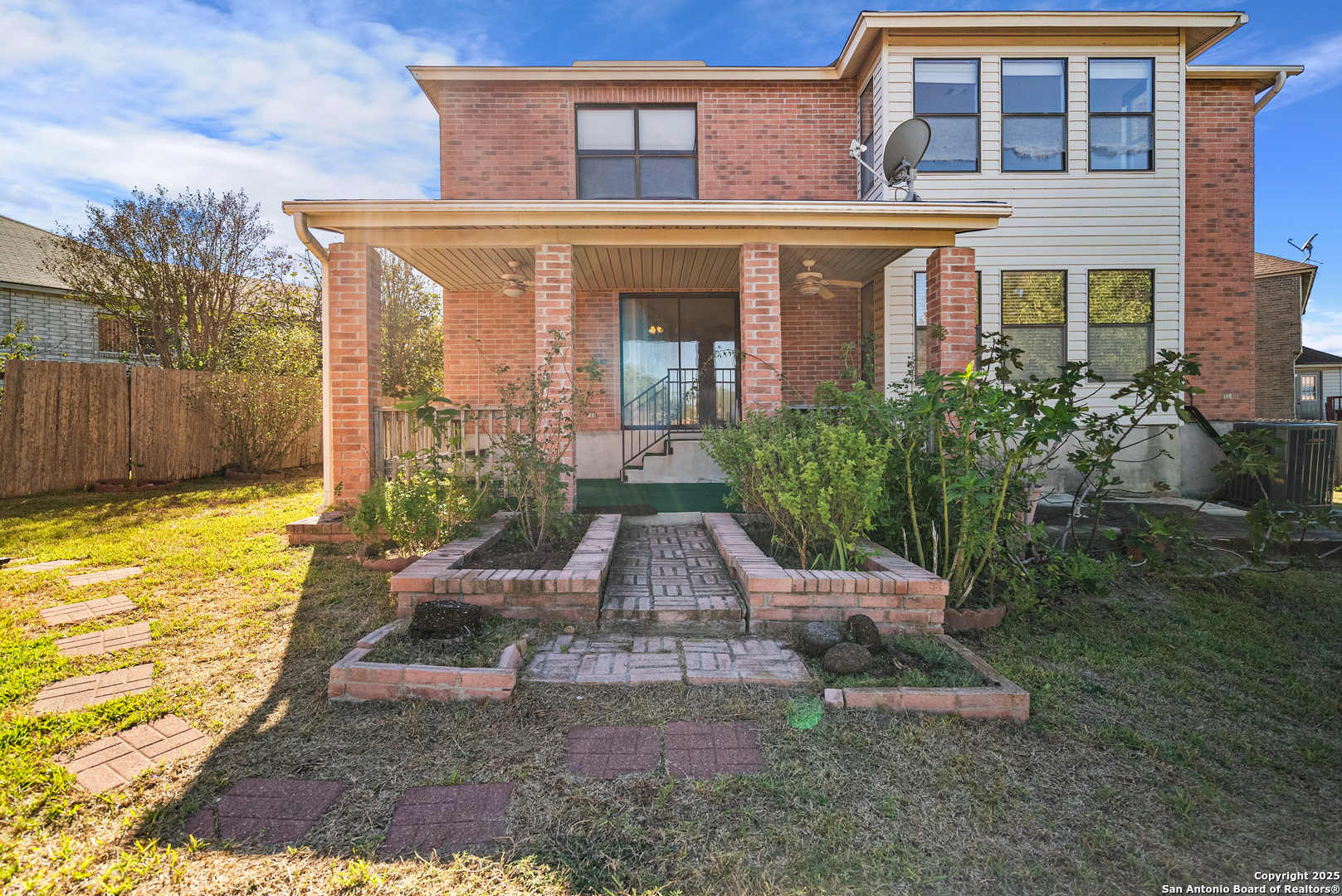 7723 Red River Bay Converse, TX 78109 - Photo 16 of 16 a front view of a house with garden