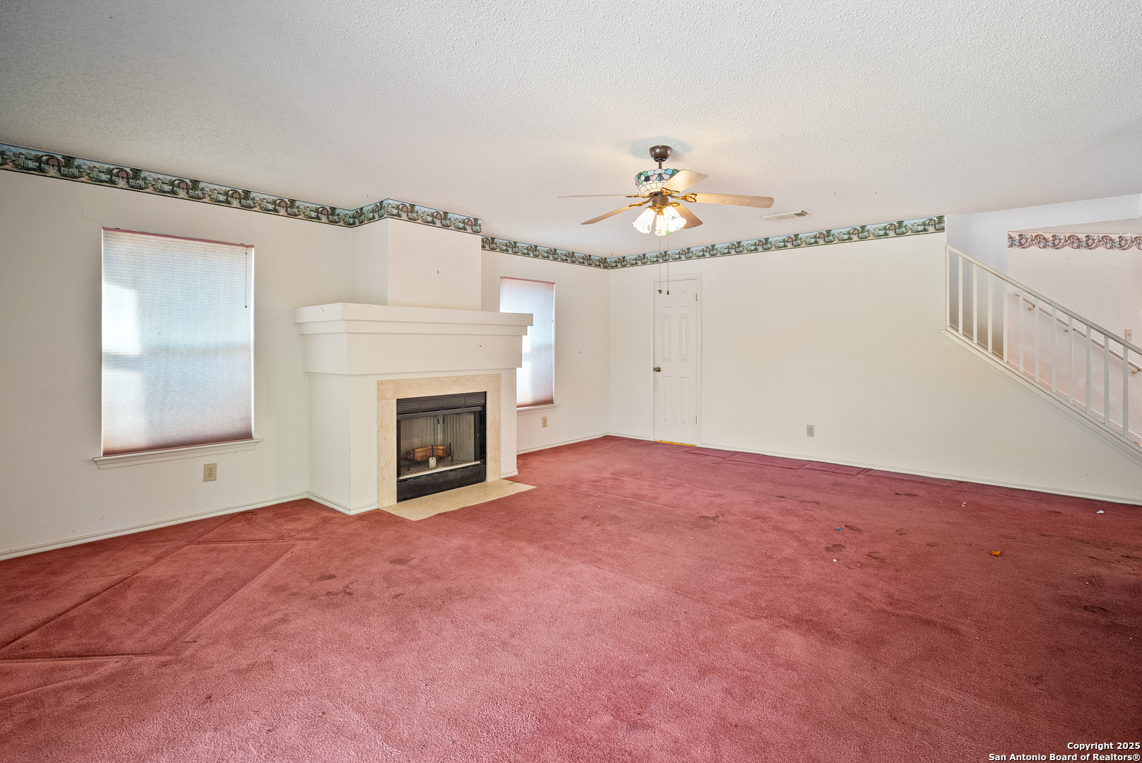 7723 Red River Bay Converse, TX 78109 - Photo 5 of 16 a view of livingroom with furniture and fireplace