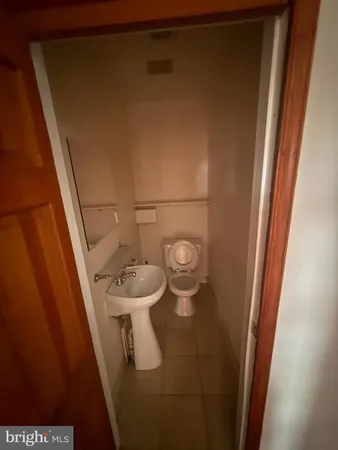 a view of a hallway with windows