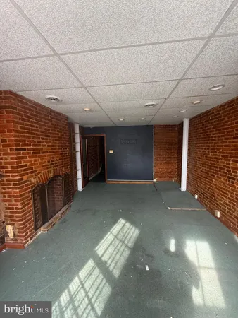 a bathroom with a toilet and a sink