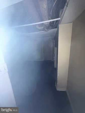 a storage room with washer and dryer