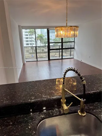 a room with water heater and a window